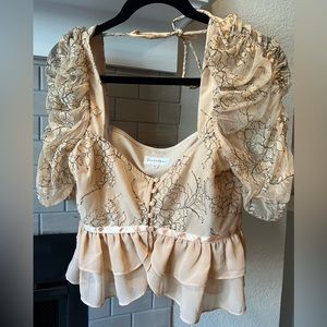 Cute cropped blouse from Revolve.